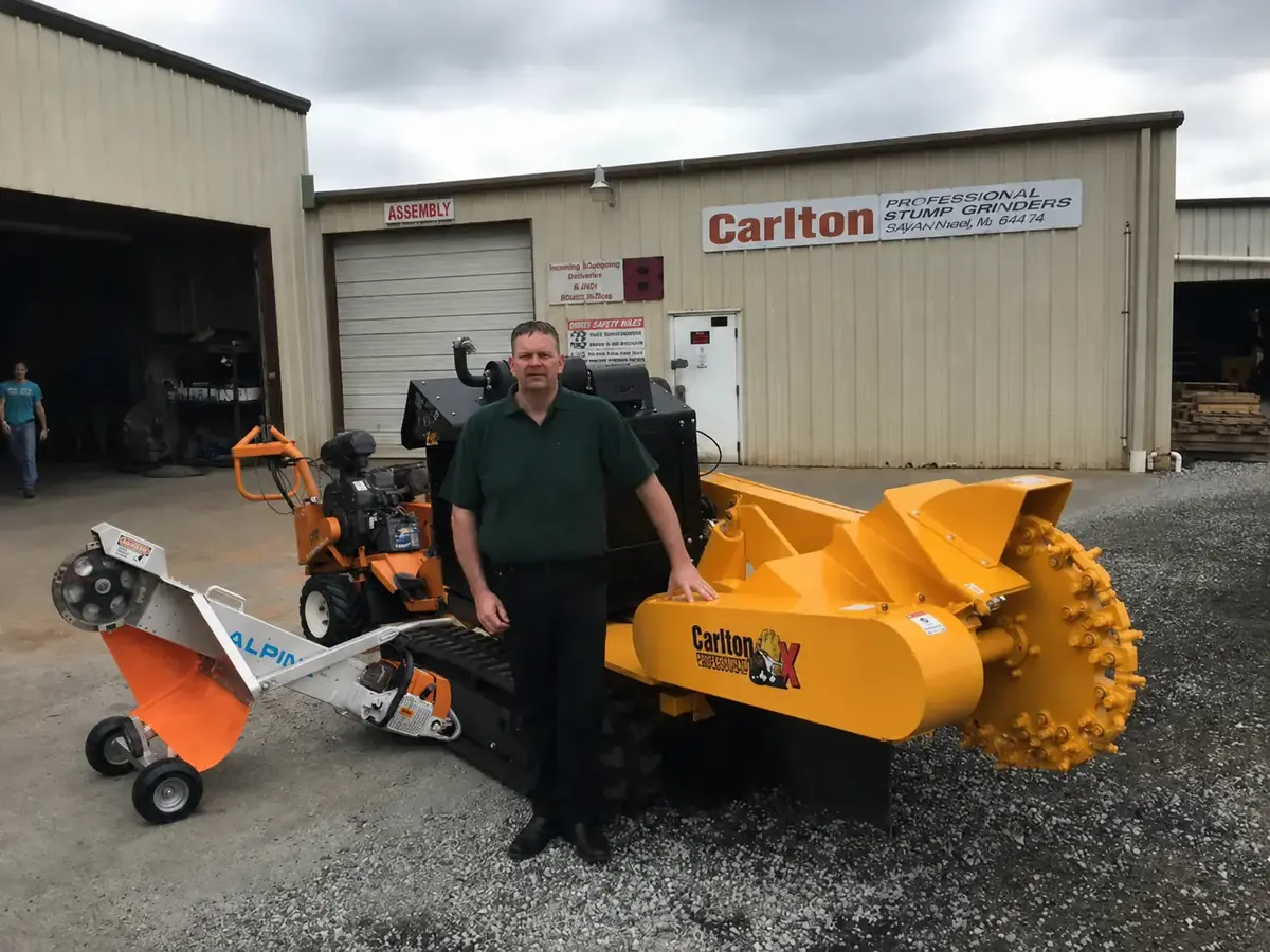 Just Stumps crew with narrow-access and large-capacity stump grinders